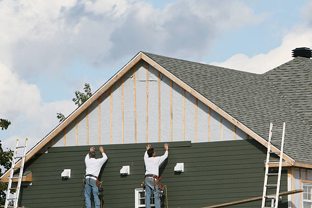 Professional Emergency Siding Repair technician working in Adamsville, OH